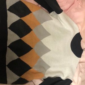 Black cluster sweater with diamond patterns